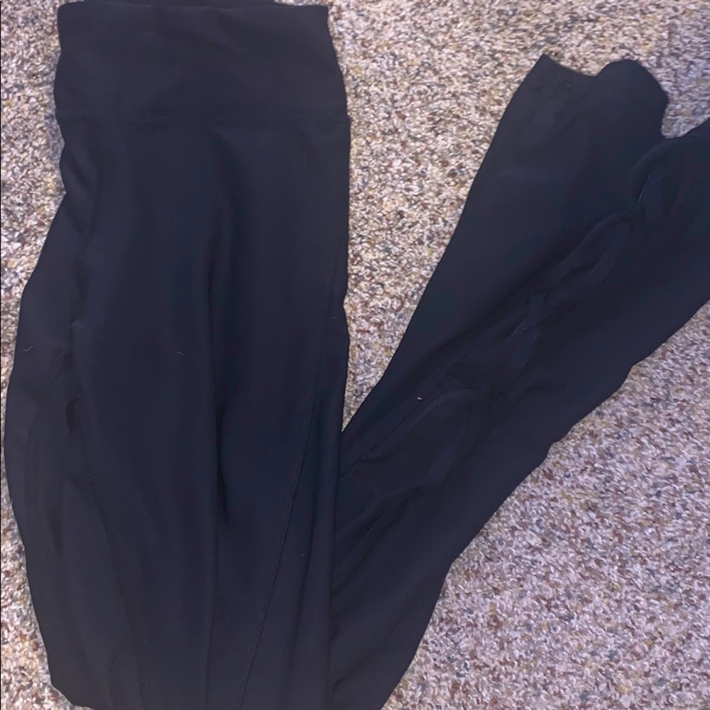 black leggings with cross on side